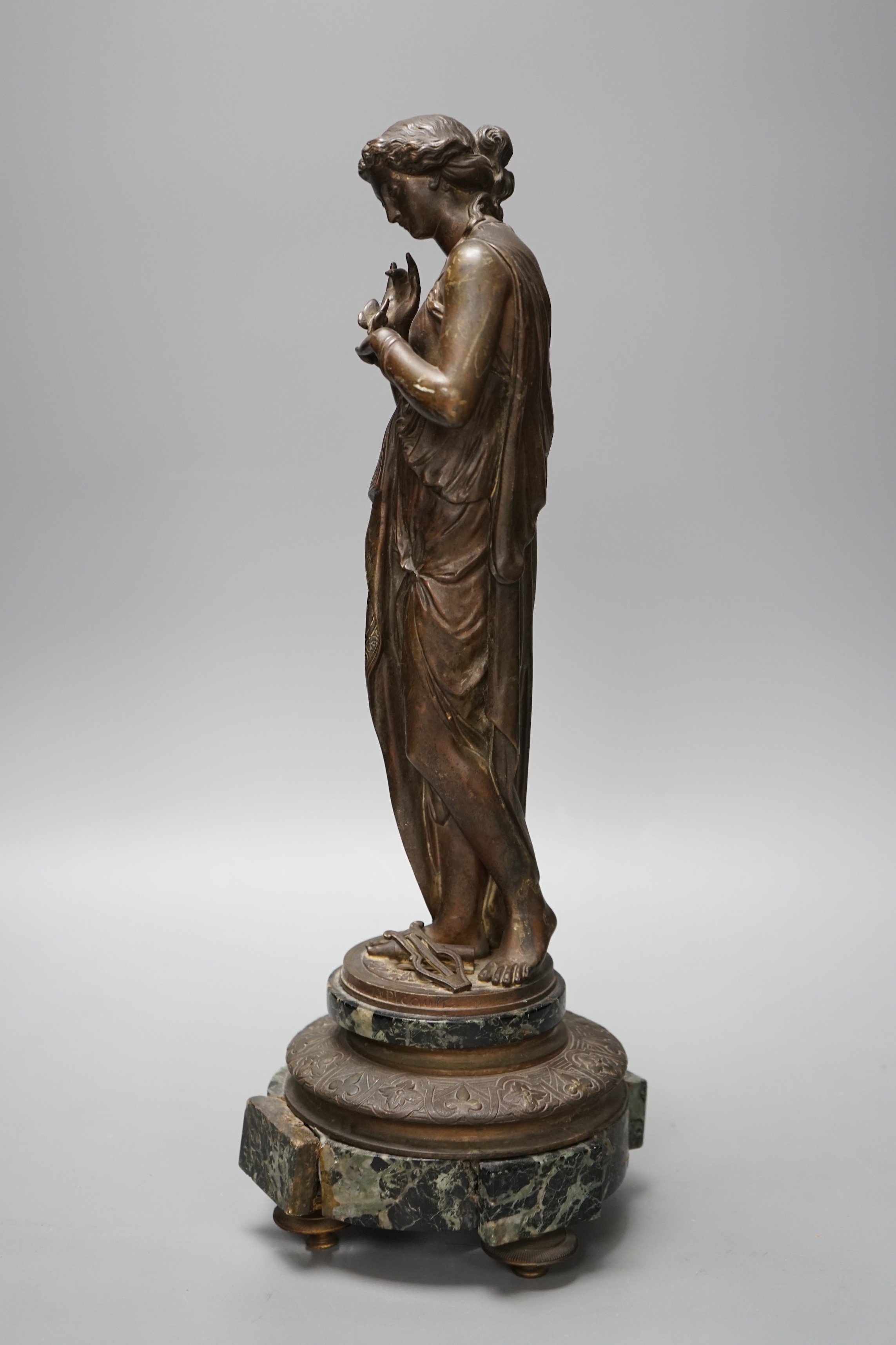 Émile Louis Picault (1833-1915), a bronze of a classical figure holding a butterfly, on marble base, 39cm